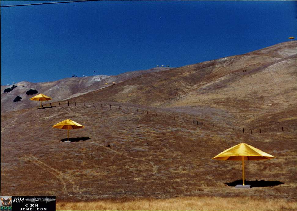 1760 Giant Yellow Umbrella Art Exhibit in Gorman California by Christo Javacheff of Bulgaria, October 1991. JCMDI.COM